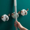 Creative cartoon mop hook, wall-mounted fixed snap-on storage rack, hanging rack, no-hole broom clamp, bathroom hook details Picture